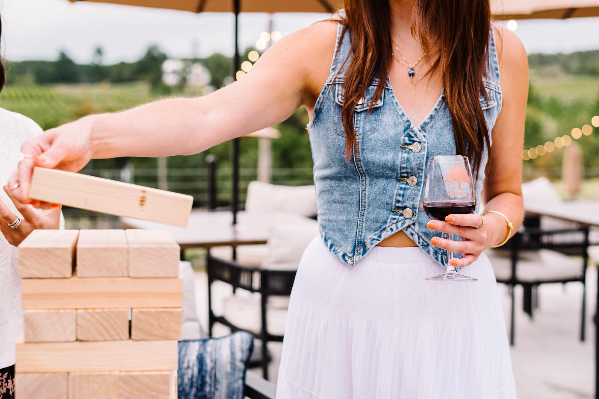 Woman enjoying a Fourth of July weekend celebration at Barrel Oak